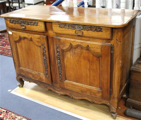 A late 18th century French provincial fruitwood side cabinet, W.138cm D.52.5cm H.94.5cm